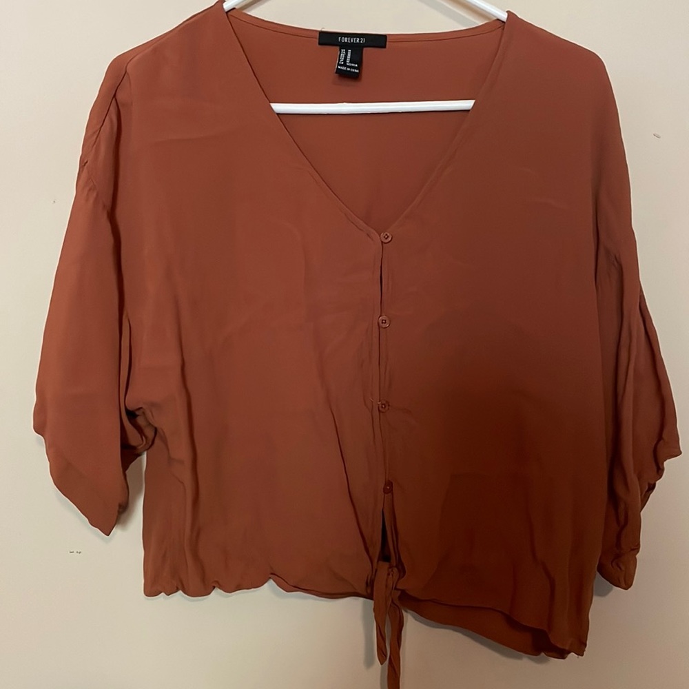 3 for $6 bundle and offer 😉 Crop blouse rust color with tie